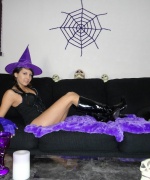 Andi Land is a purple witch