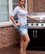 Nikki decides to get topless while cooking on the grill.