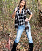 Nikki Sims playing in the woods
