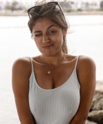 Ella Knox shows off her huge boobs in a figure hugging white dress while wearing no knickers